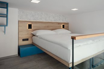 EA Hotel Moment - Doppelzimmer mit Zustellbett - Maisonette
